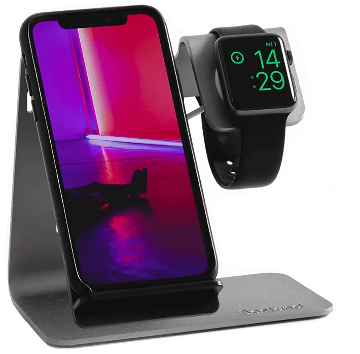 Phone and smartwatch on a charging stand